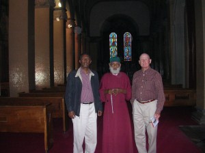 :  Berhane, Priest, and Doug at Kiddist Selassie Cathedral, where Emperor Haile Selassie and Empress Menen are buried